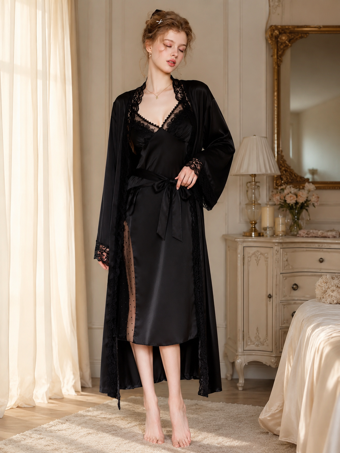 Black satin lace robe and chemise set on model in bedroom