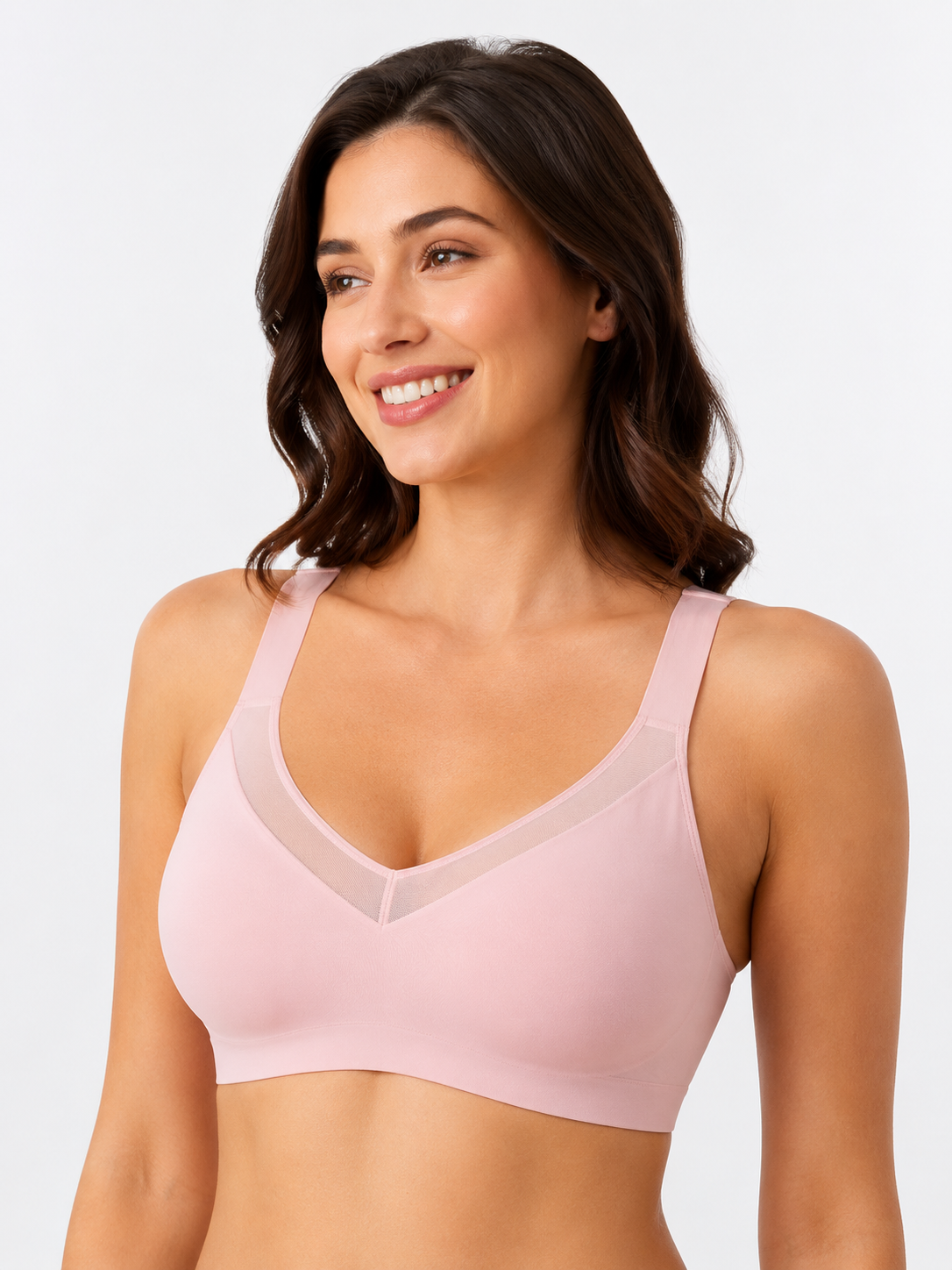 Model wearing Soft Noir blush pink wireless seamless comfort bra