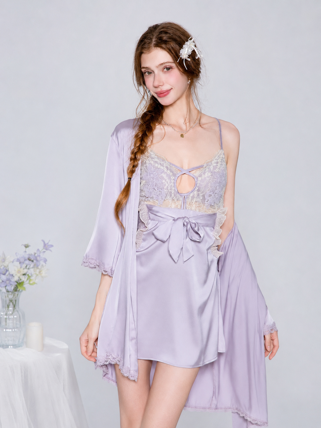 Model wearing lavender satin lace chemise with matching robe