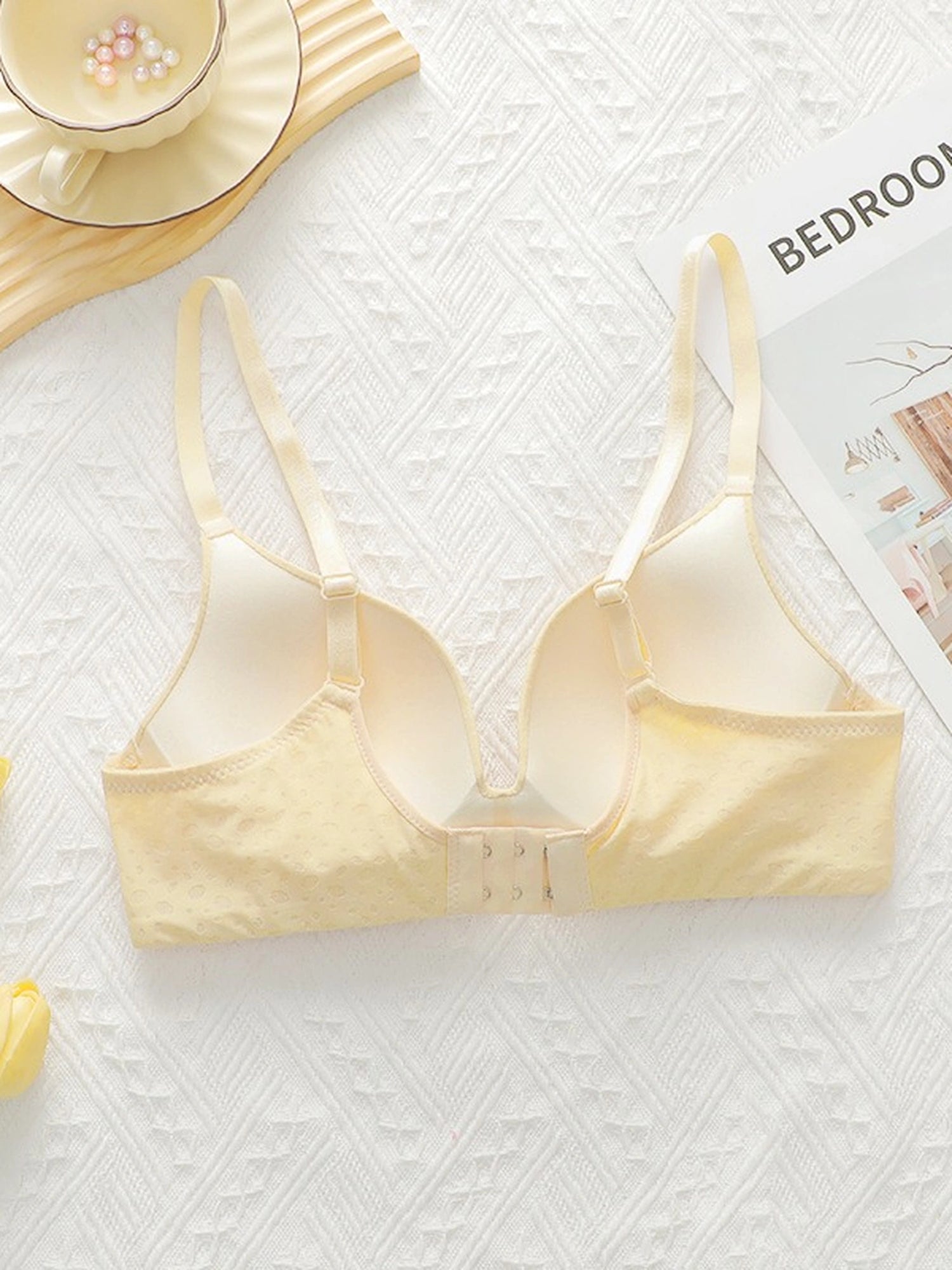 Soft Noir nude beige seamless bra back view with adjustable straps and hook closure