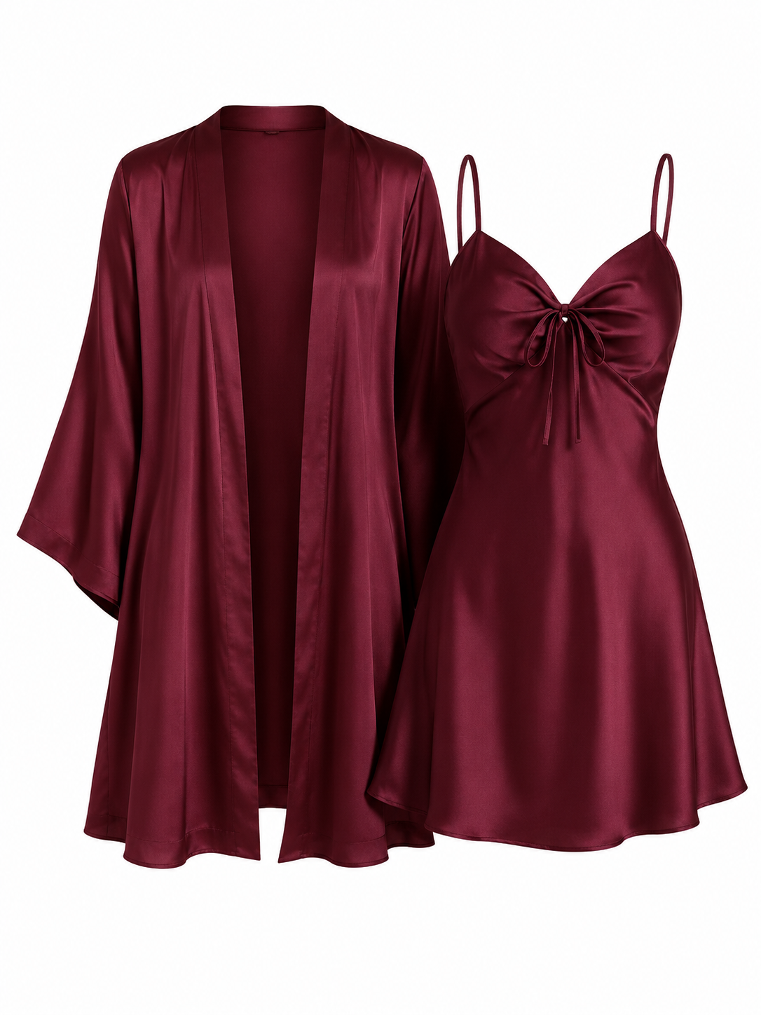 Model wearing Soft Noir burgundy satin bow nightgown and robe set in an elegant bedroom