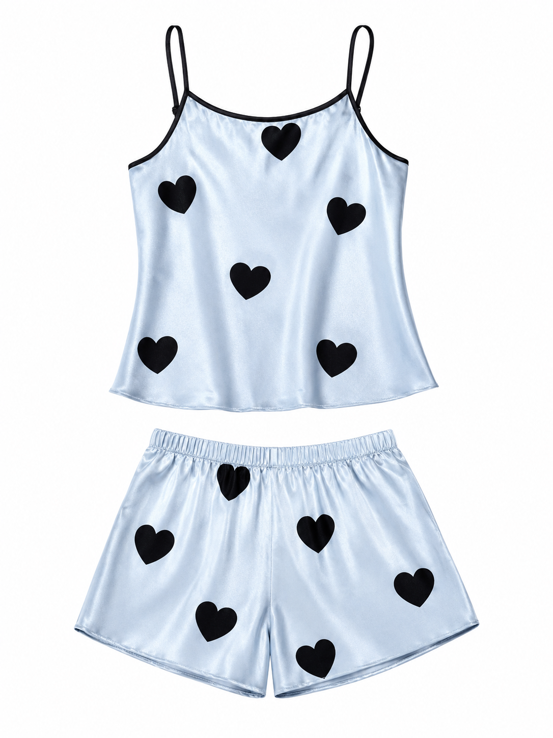 Light blue satin cami and shorts pajama set with black heart print on white background