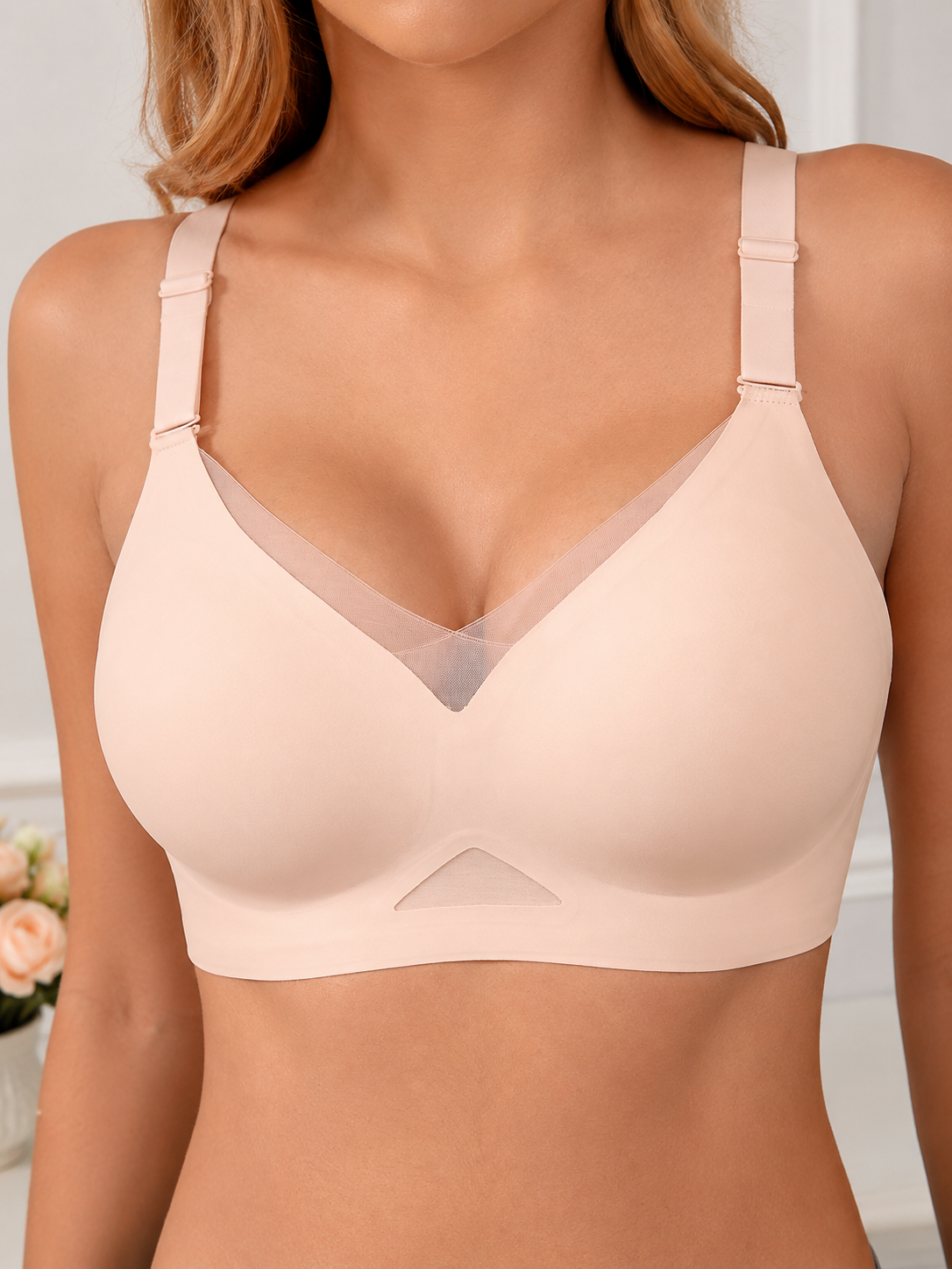 Model wearing Soft Noir blush pink mesh V-neck wireless seamless bra