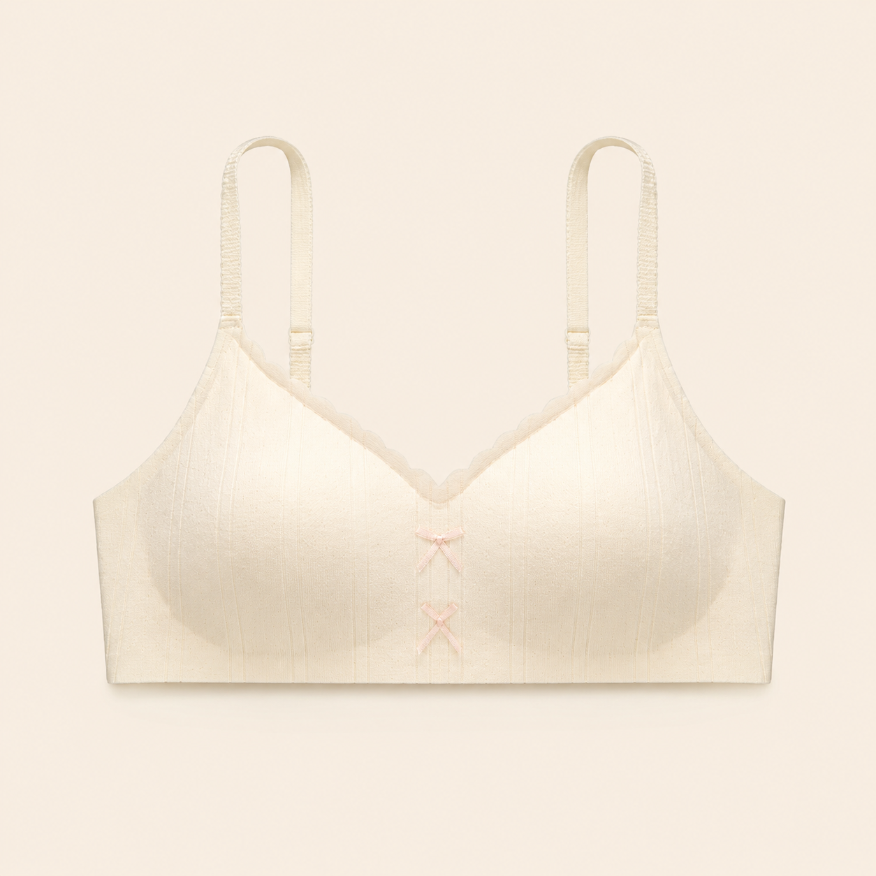 Soft Noir Bow Detail Smooth Wireless Bra in cream for refined lingerie styling