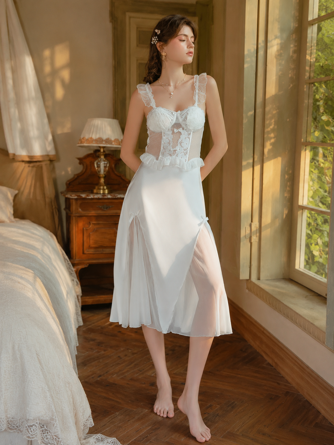 Model wearing soft ivory lace ruffle strap midi nightgown