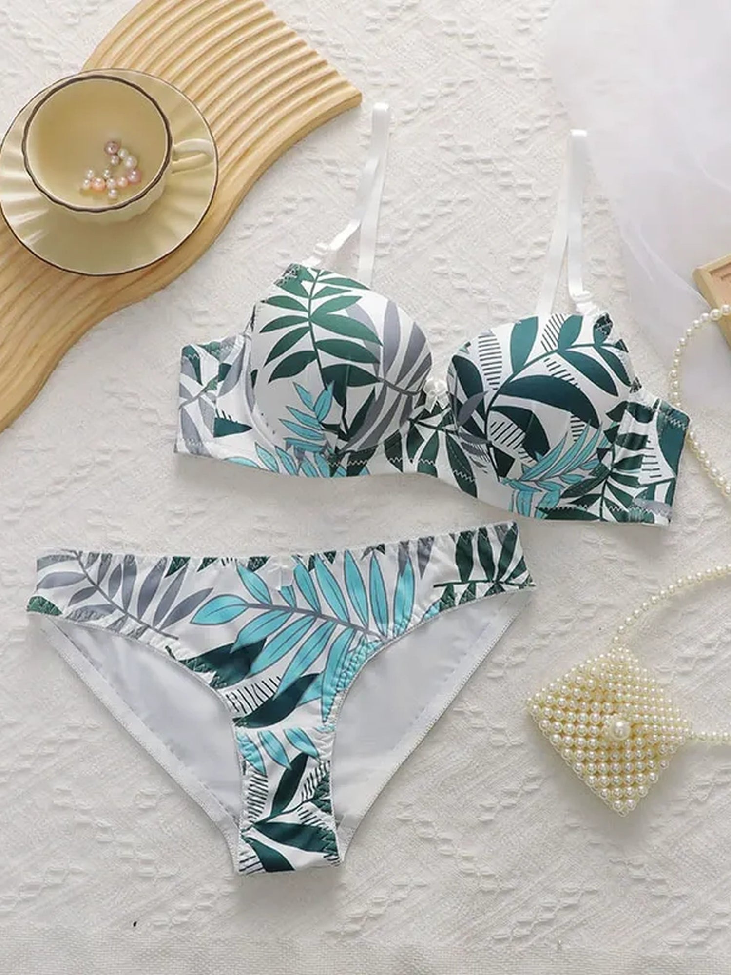 Soft Noir tropical leaf print padded bikini set flat lay front view